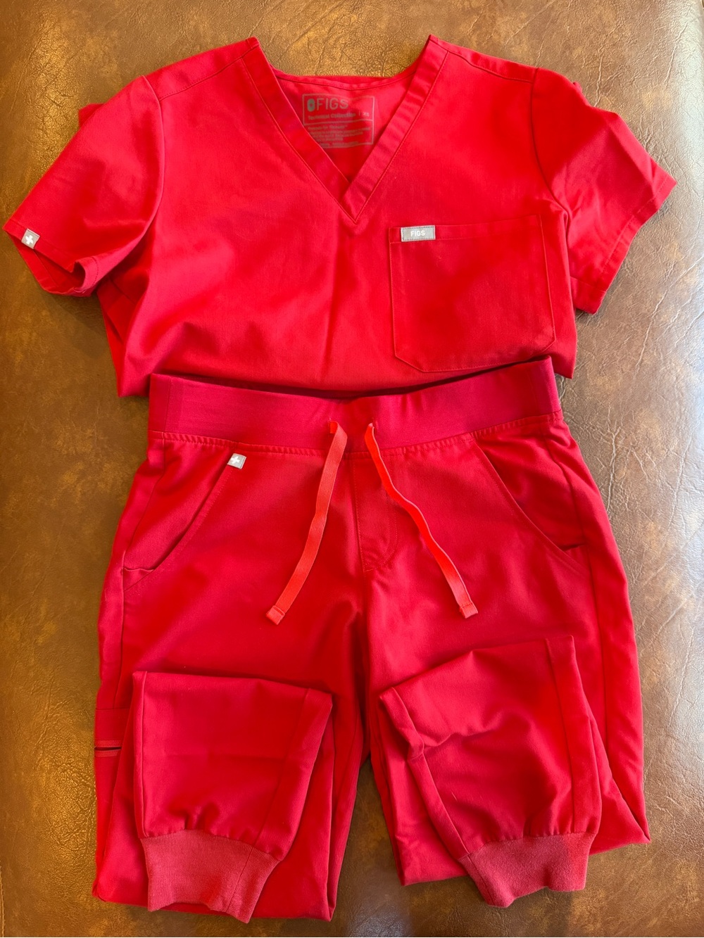 FIGS V-Neck Scrub Top in Vibrant Pink